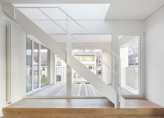 architekt huismans penthouse wohnbereich treppenaufgang frontansicht